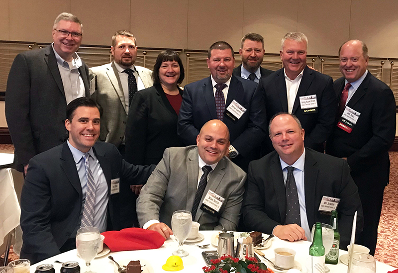 LeChase leaders at the Excellence in Construction & Real Estate awards dinner