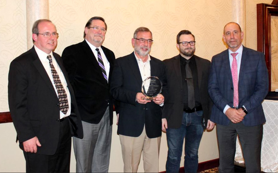 Image of YMCA Buffalo Niagara, CJS Architects and LeChase attendees with Lockport Family YMCA award