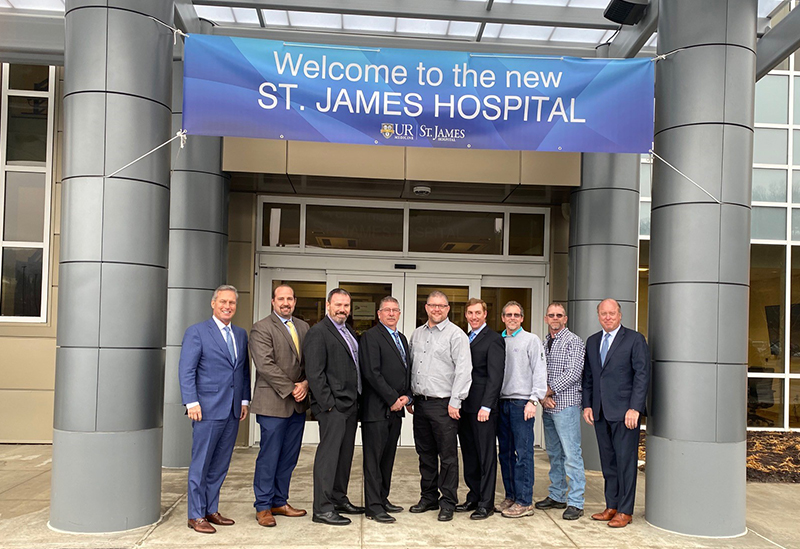 LeChase representatives in front of new St. James Hospital